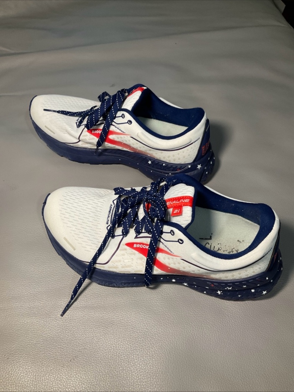 Brooks White Running Shoes with Navy and Red Accents